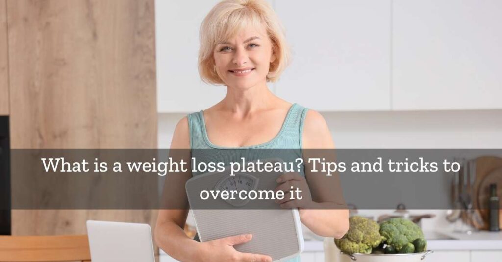 Woman holding a scale wondering why she faces a weight loss plateau